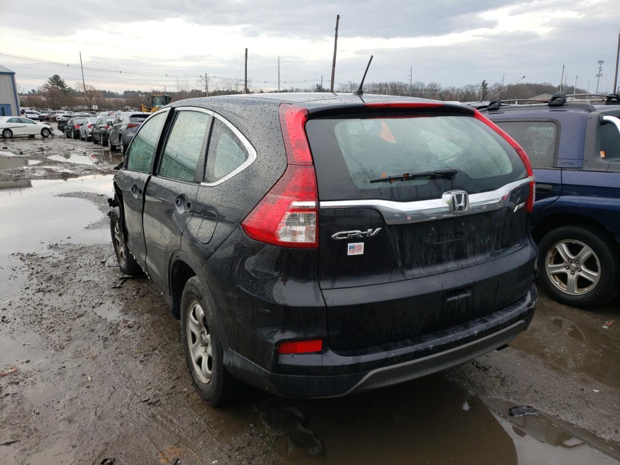 Photo 3 from auction – 2016 HONDA CR-V LX with VIN 5J6RM4H32GL000912