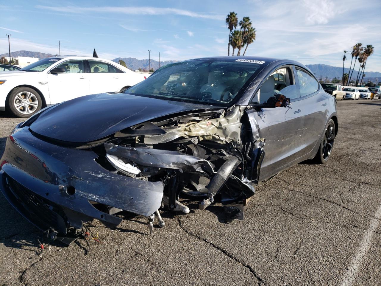 Photo 2 from auction – 2018 TESLA MODEL 3 with VIN 5YJ3E1EB7JF079989