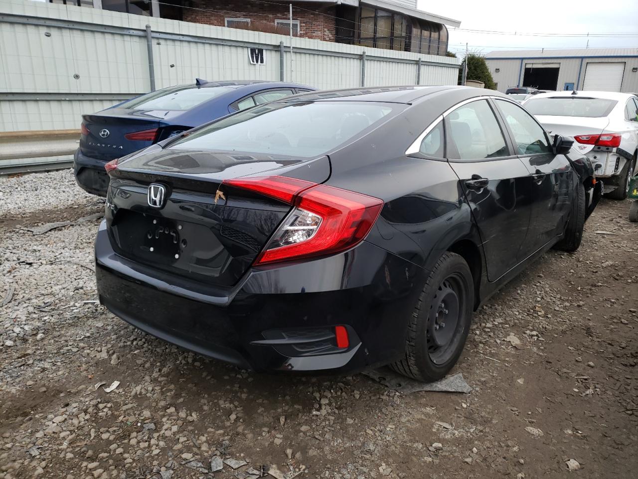 Photo 4 from auction – 2017 HONDA CIVIC LX with VIN 2HGFC2F53HH542301