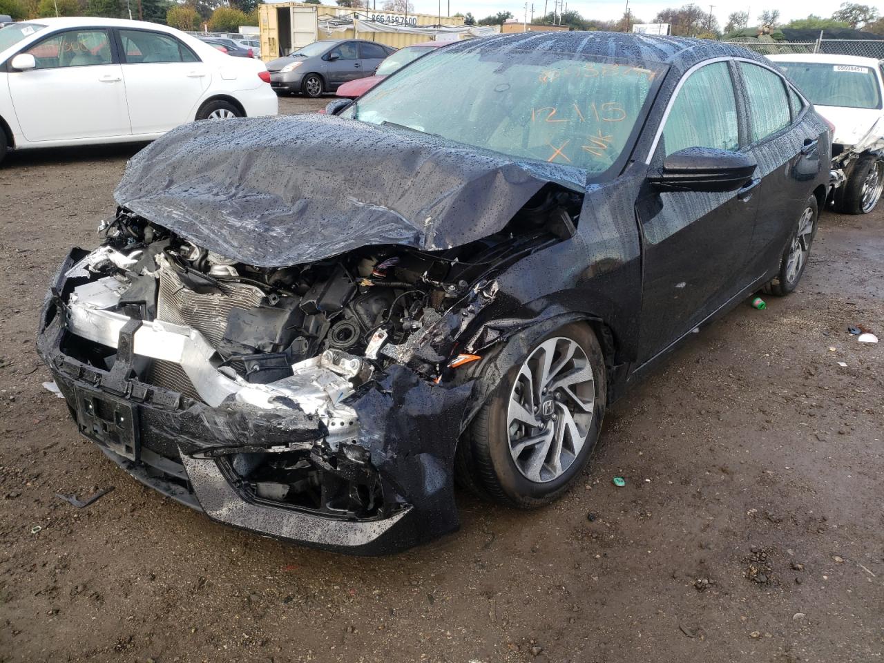 Photo 2 from auction – 2018 HONDA CIVIC EX with VIN 19XFC2F76JE201430