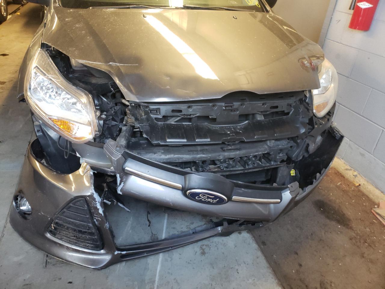 Photo 9 from auction – 2012 FORD FOCUS SE with VIN 1FAHP3K25CL374997