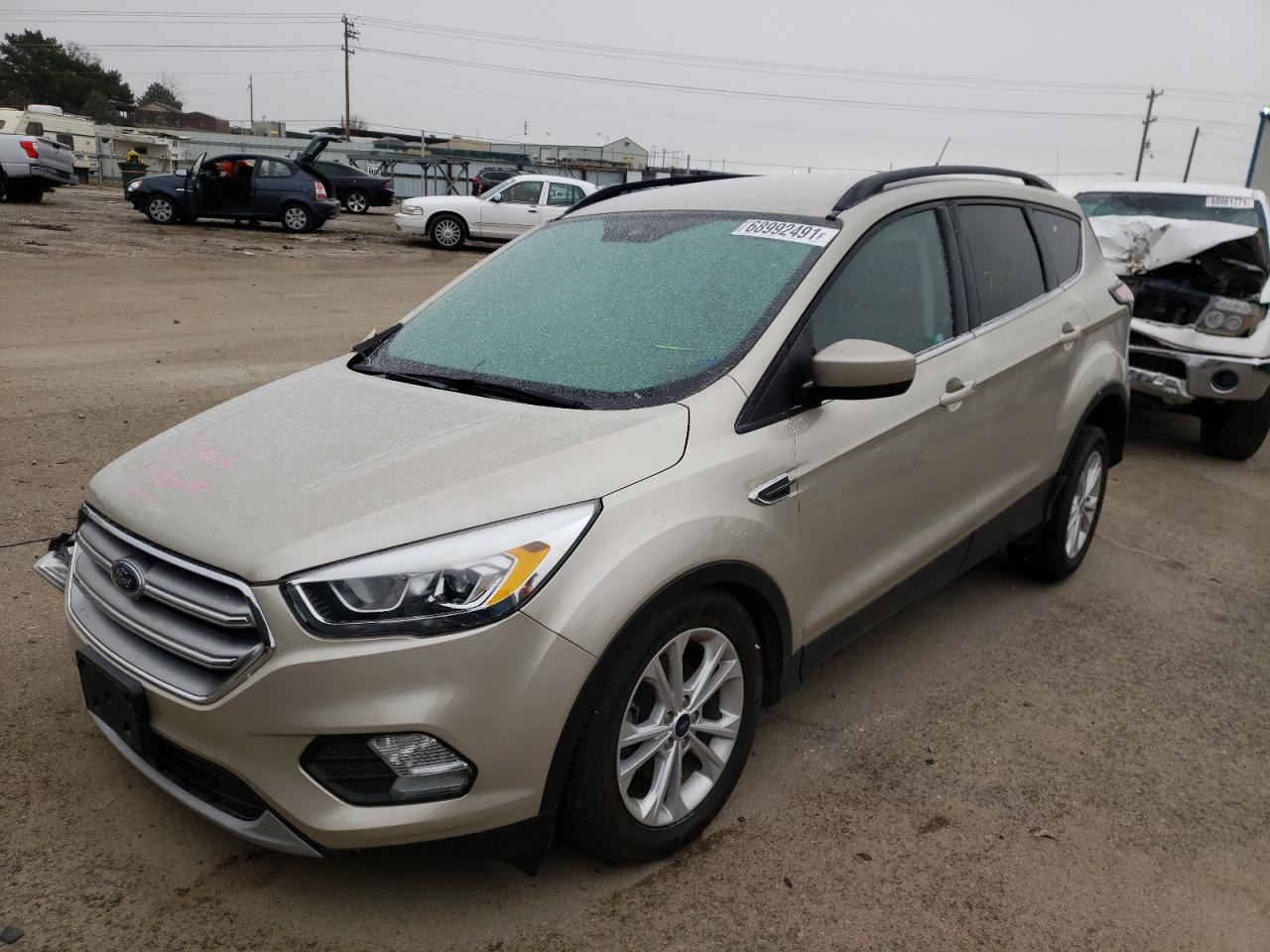 Photo 2 from auction – 2017 FORD ESCAPE SE with VIN 1FMCU0GD5HUB80120