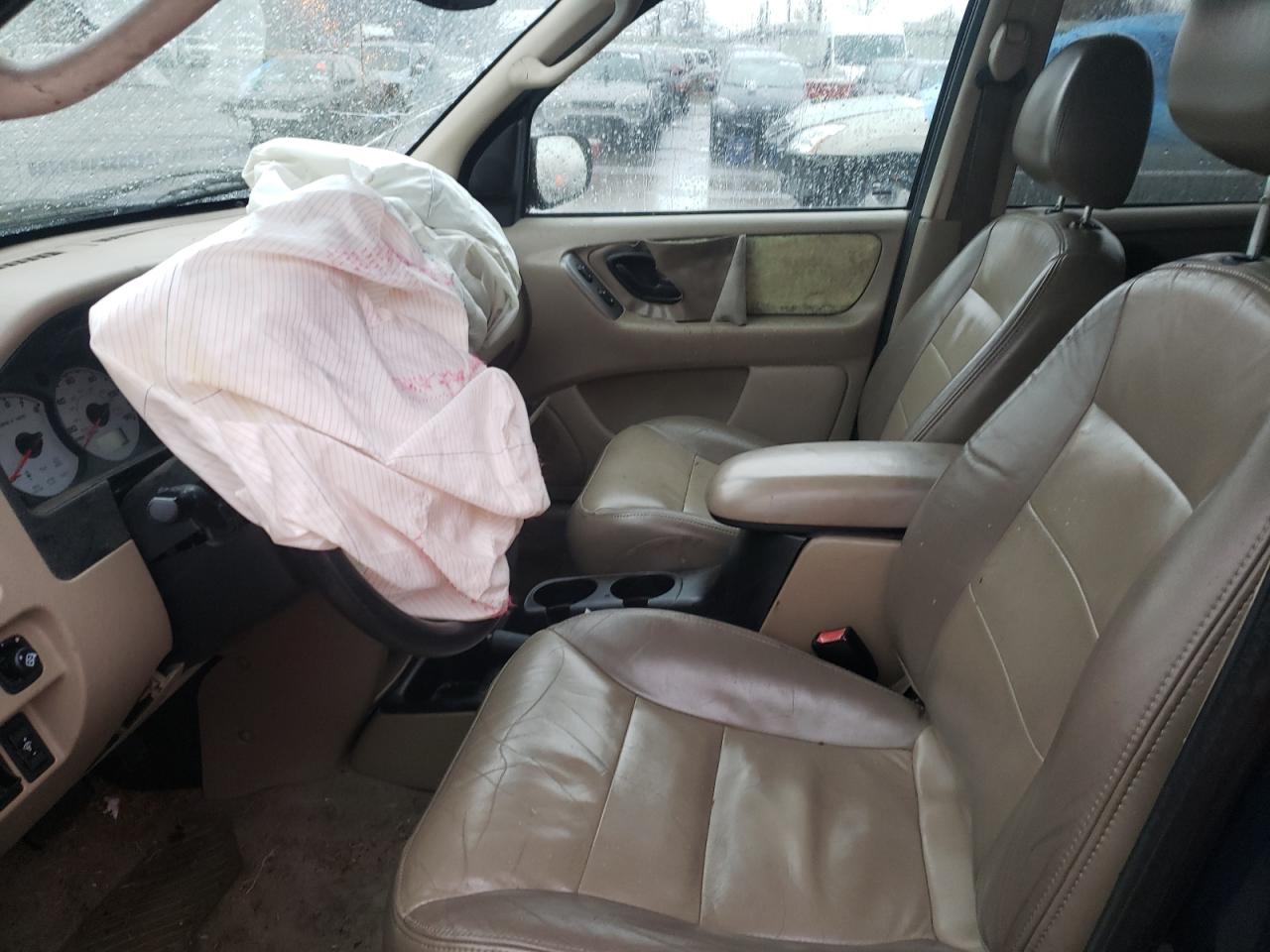 Photo 5 from auction – 2004 FORD ESCAPE LIM with VIN 1FMCU94144KA30875