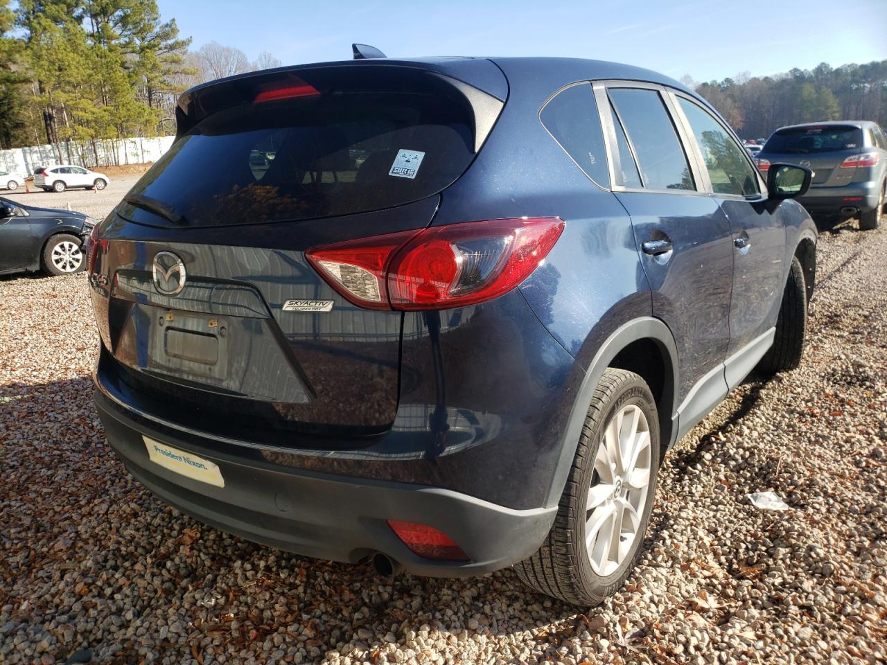 Photo 4 from auction – 2015 MAZDA CX-5 GT with VIN JM3KE2DY5F0552731