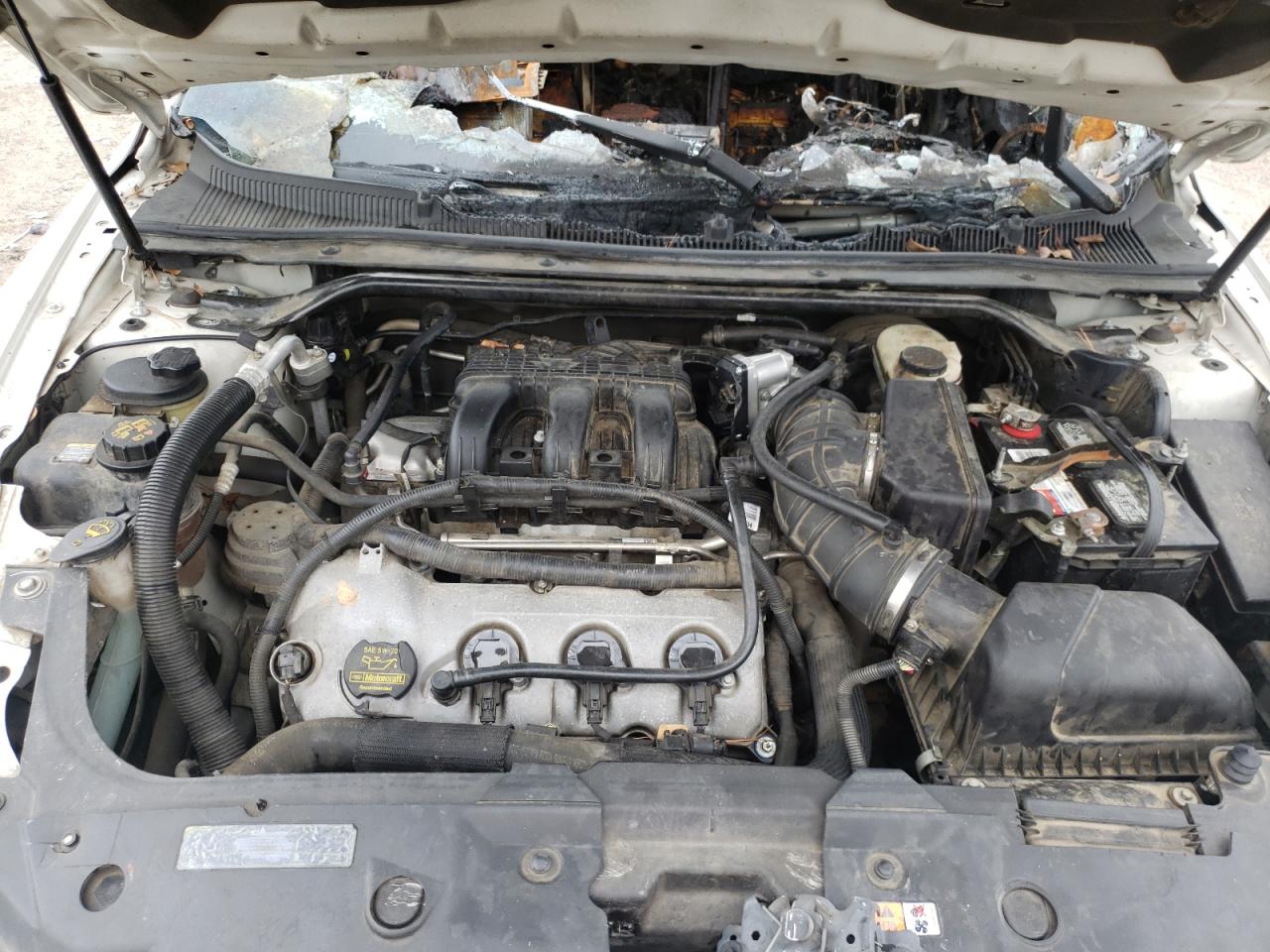 Photo 7 from auction – 2012 FORD TAURUS SEL with VIN 1FAHP2EW9CG124468