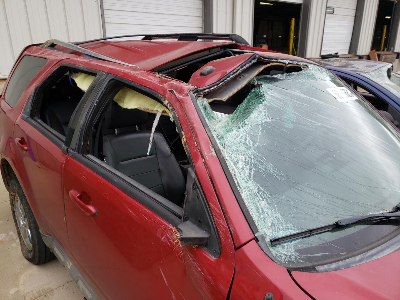 Photo 9 from auction – 2009 FORD ESCAPE LIM with VIN 1FMCU04G09KB71207