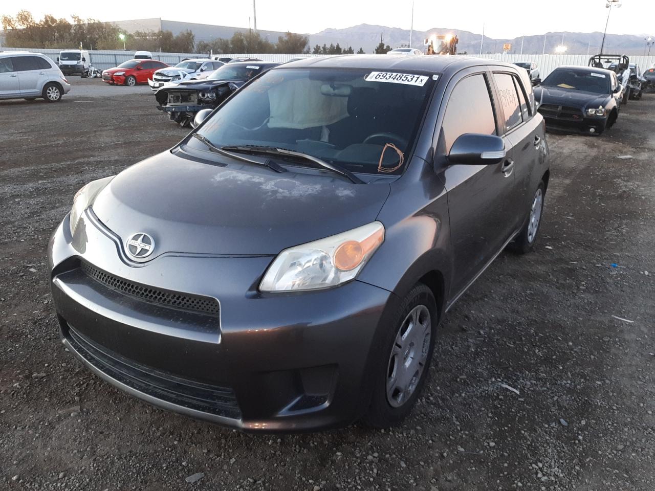 Photo 2 from auction – 2010 TOYOTA SCION XD with VIN JTKKU4B45AJ057089