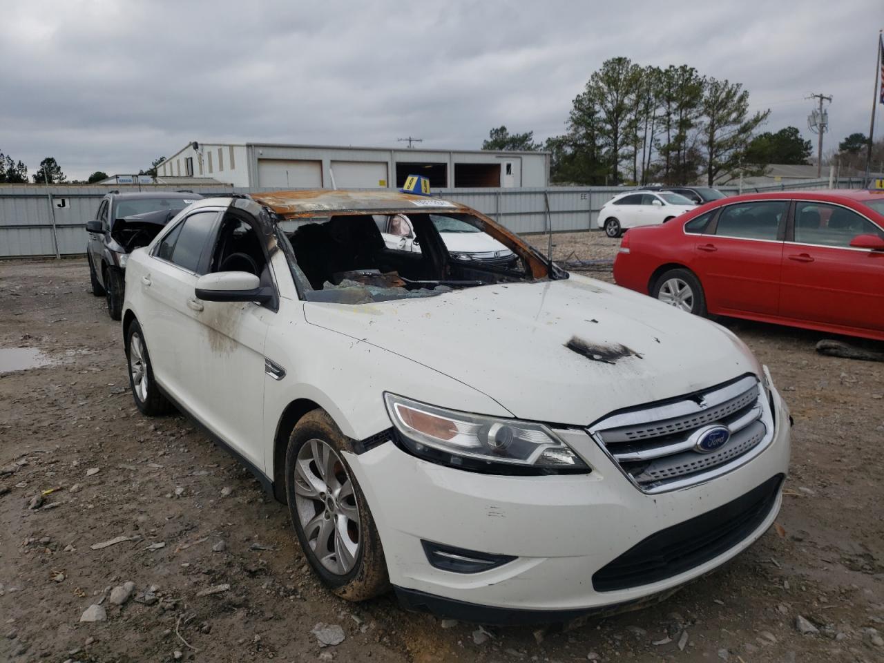 FORD TAURUS SEL 2012 with VIN 1FAHP2EW9CG124468 - Photo from auction