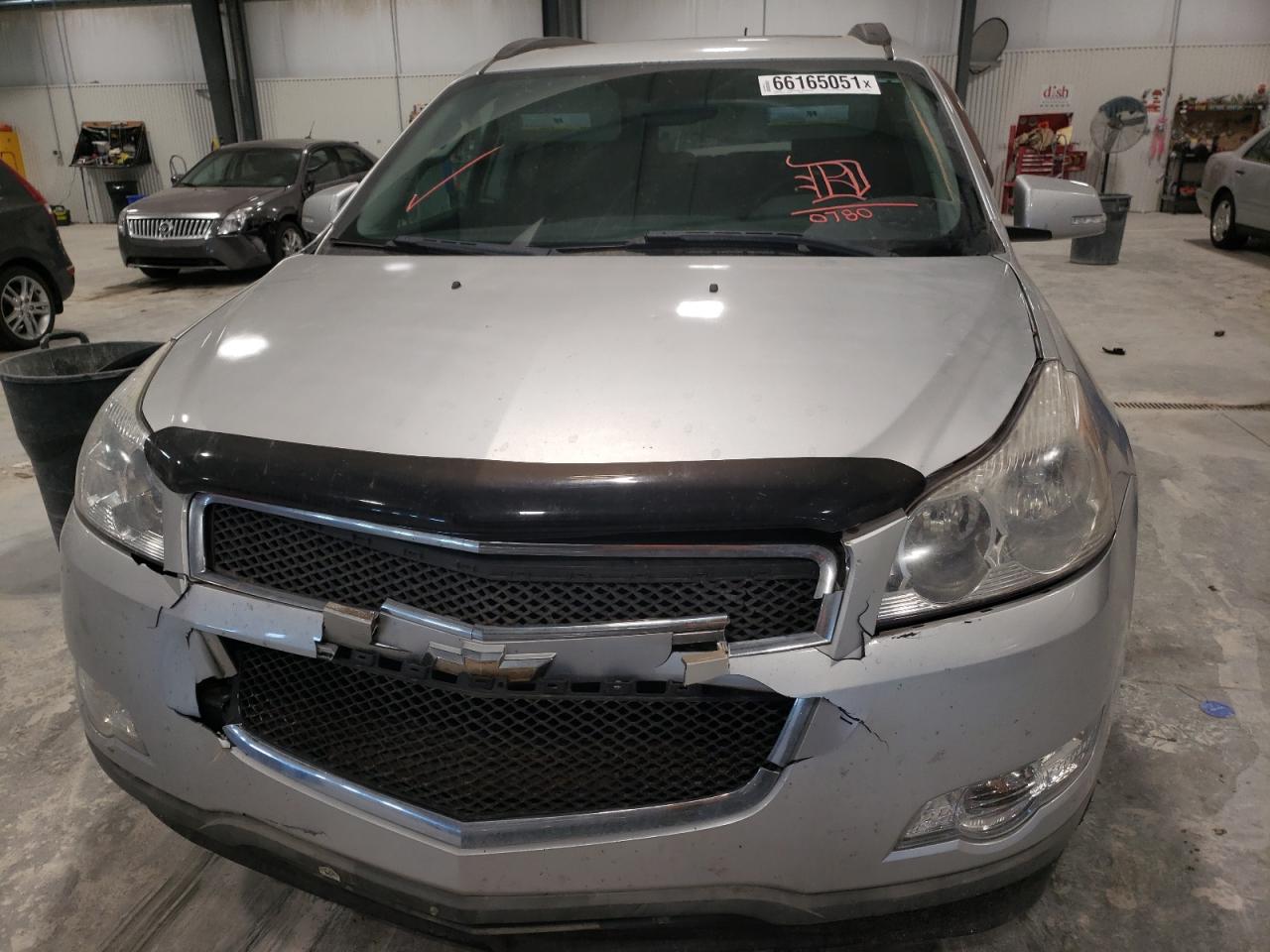 Photo 9 from auction – 2009 CHEVROLET TRAVERSE L with VIN 1GNEV23D69S130780