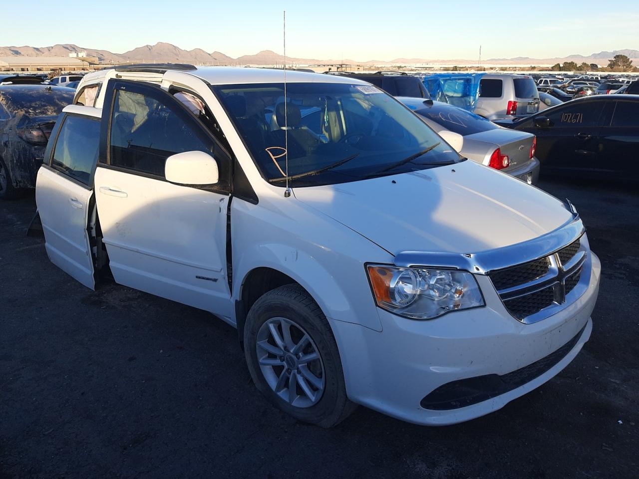 DODGE GRAND CARA 2016 with VIN 2C4RDGCG2GR317923 - Photo from auction