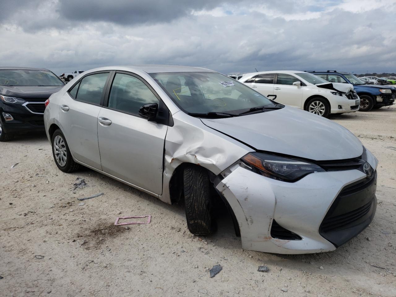 TOYOTA COROLLA L 2017 with VIN 5YFBURHE2HP702338 - Photo from auction