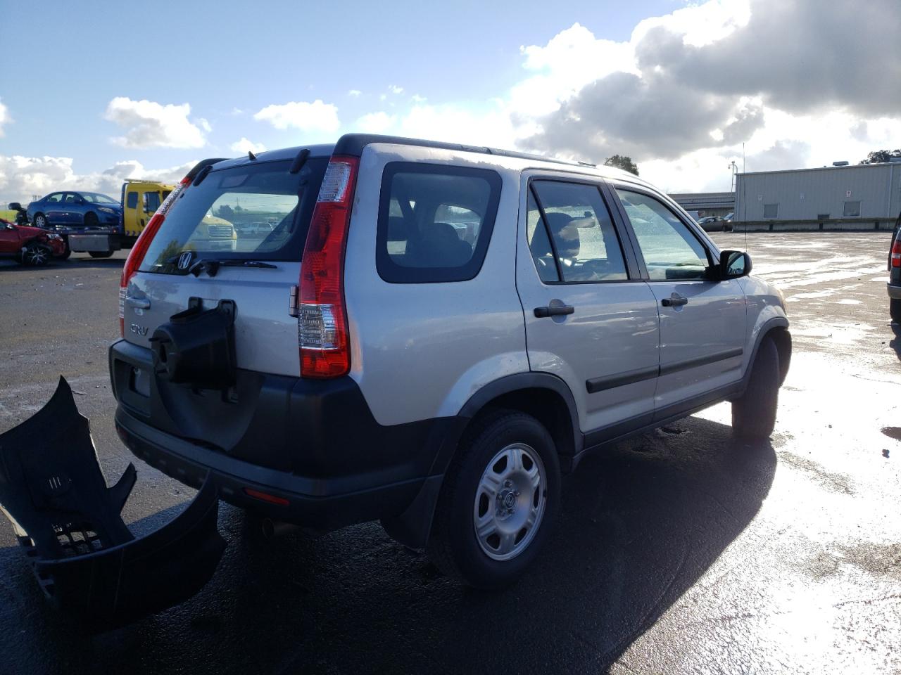 Photo 4 from auction – 2005 HONDA CR-V LX with VIN JHLRD68525C019284