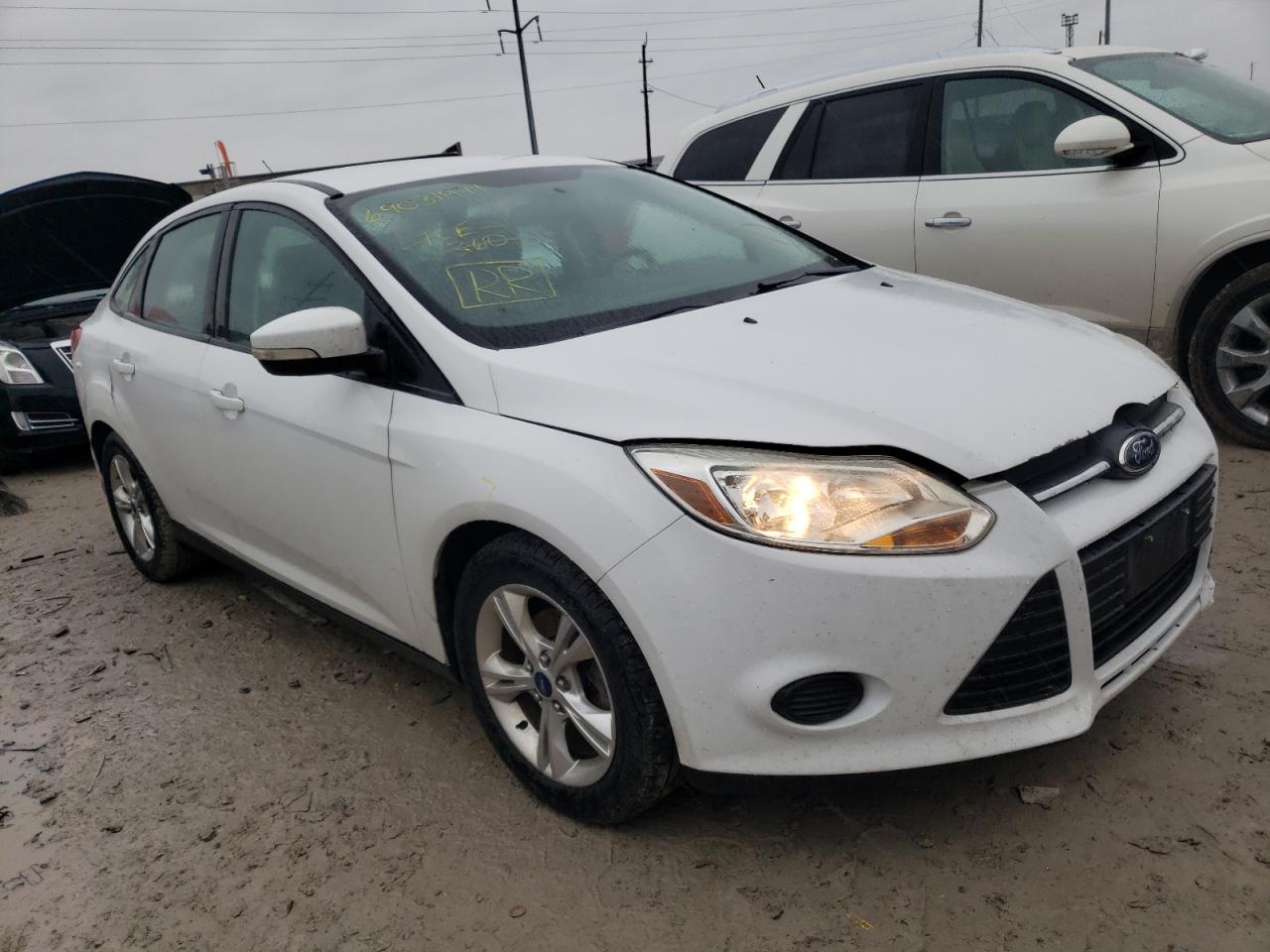 FORD FOCUS SE 2014 with VIN 1FADP3F21EL212148 - Photo from auction