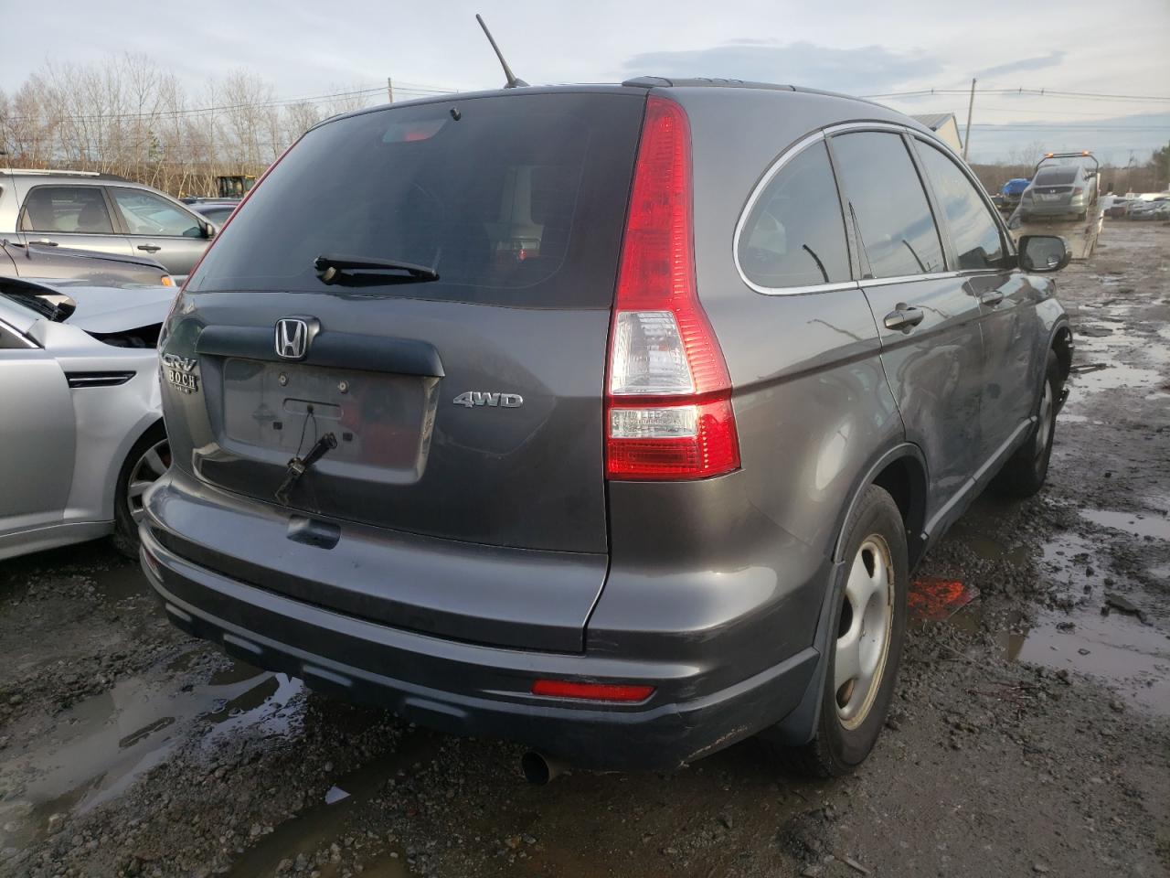 Photo 4 from auction – 2011 HONDA CR-V LX with VIN 5J6RE4H30BL078501