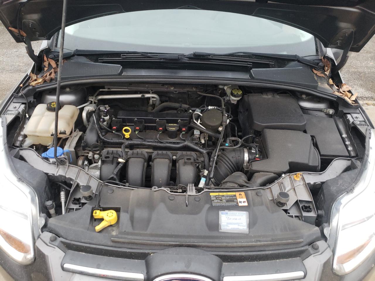 Foto 7 de la subasta – 2013 FORD FOCUS SE con VIN 1FADP3F23DL380372
