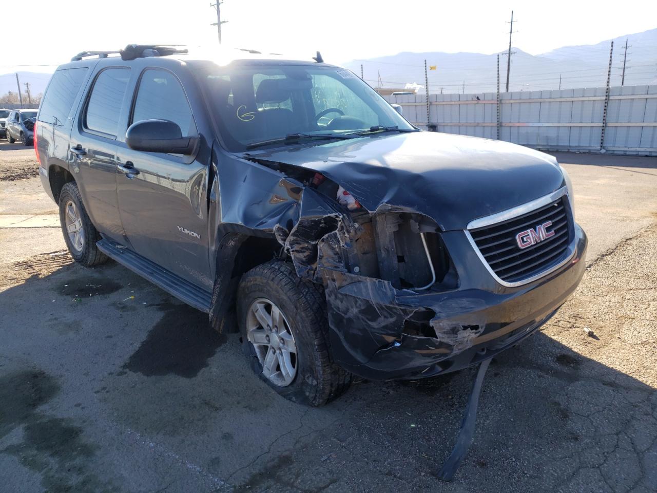 GMC YUKON SLT 2011 with VIN 1GKS2CE02BR130023 - Photo from auction