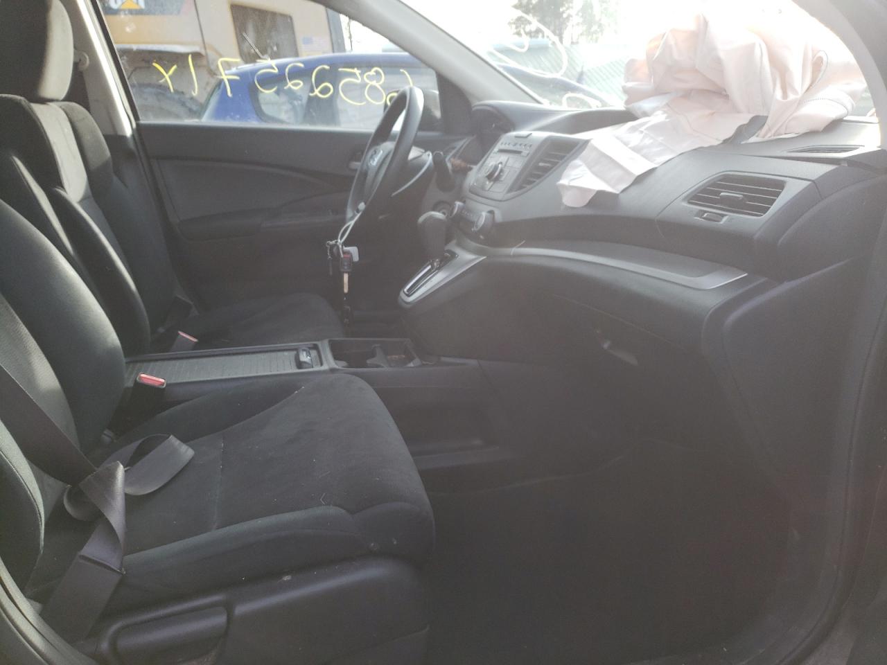 Photo 5 from auction – 2014 HONDA CR-V LX with VIN 2HKRM4H38EH718102