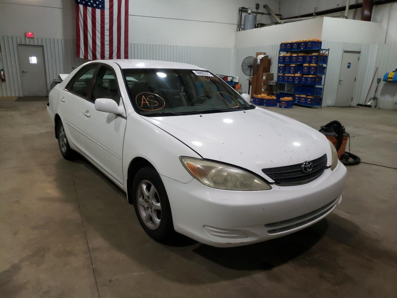 TOYOTA CAMRY 2002 with VIN 4T1BE30K52U110899 - Photo from auction