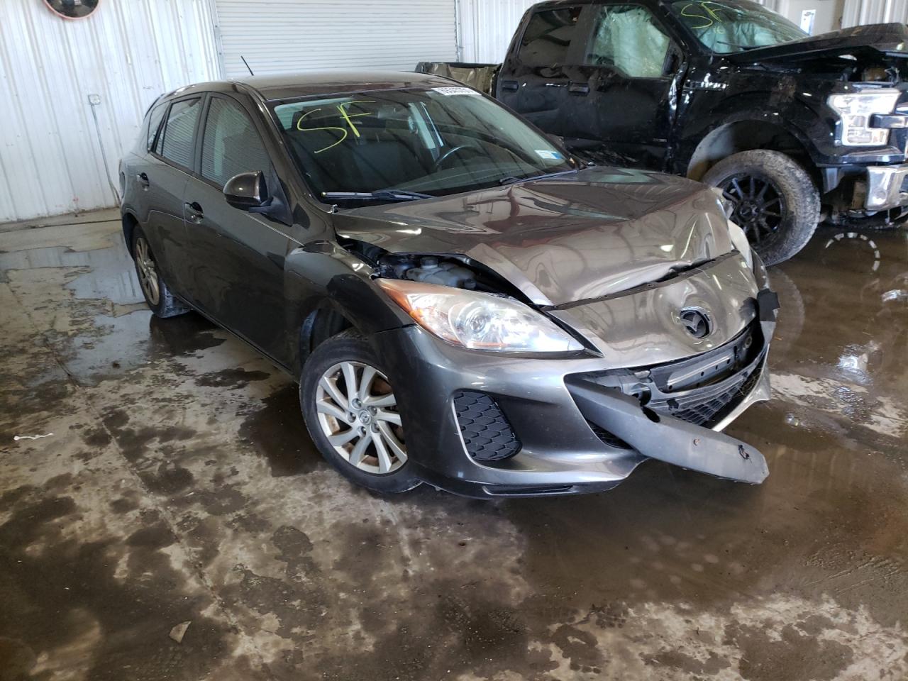 MAZDA 3 I 2012 with VIN JM1BL1L70C1608324 - Photo from auction