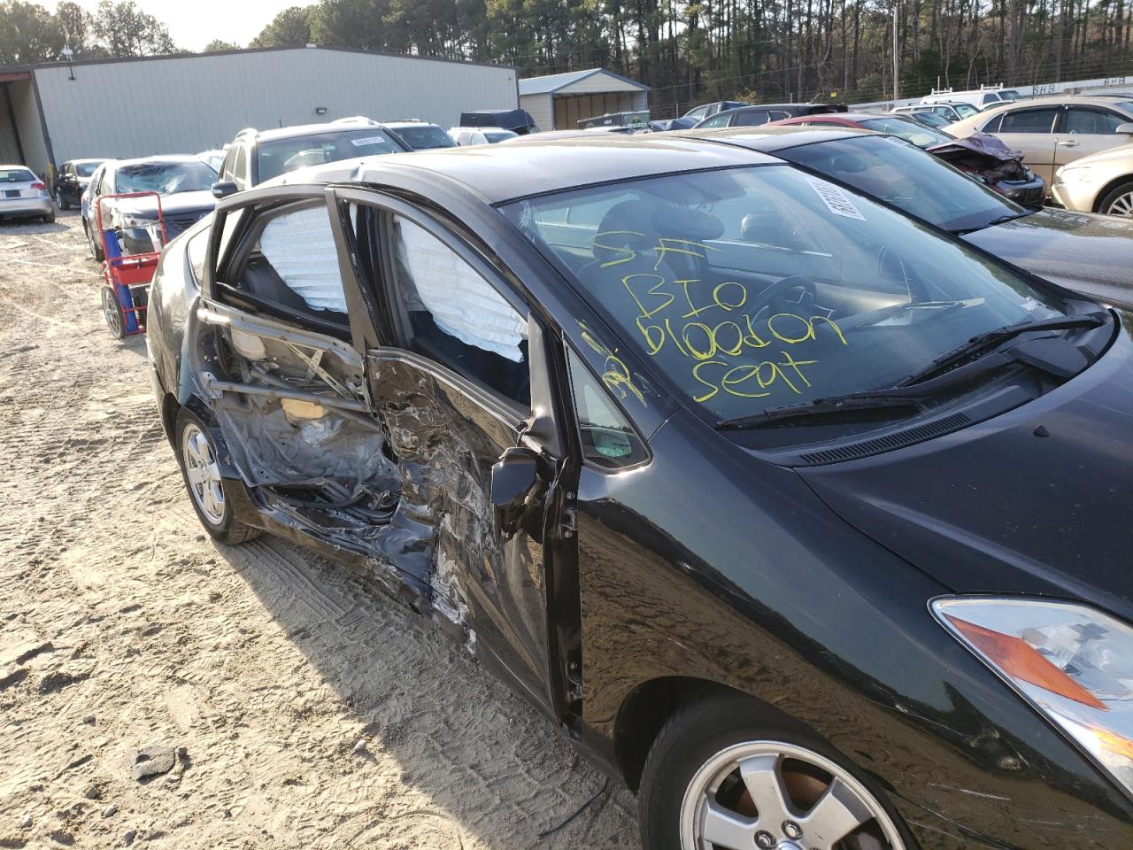 Photo 9 from auction – 2005 TOYOTA PRIUS with VIN JTDKB20U053079290