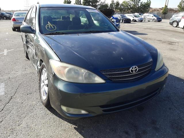 TOYOTA CAMRY LE 2003 with VIN 4T1BE32K33U702865 - Photo from auction