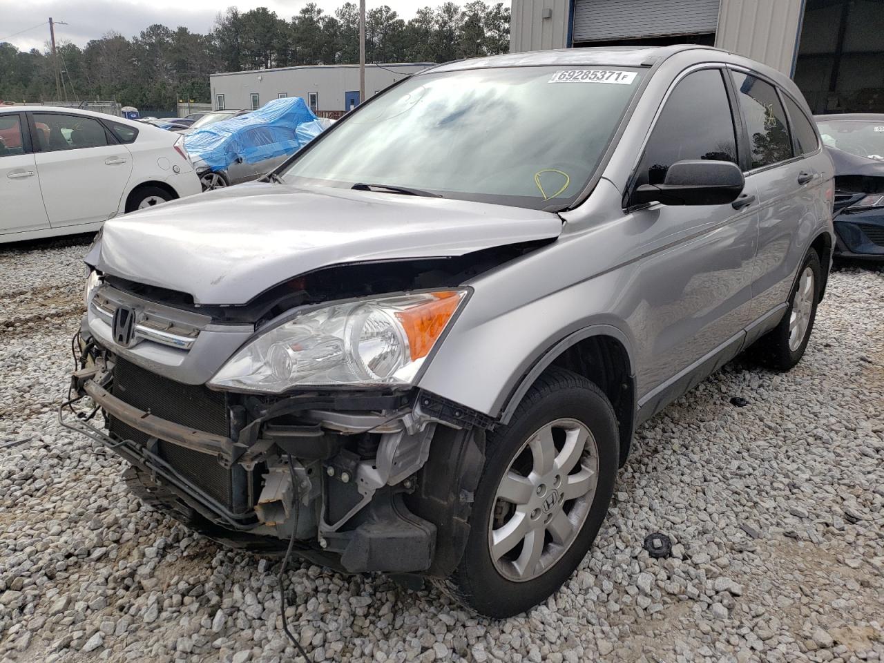 Photo 2 from auction – 2007 HONDA CRV with VIN JHLRE38517C081953