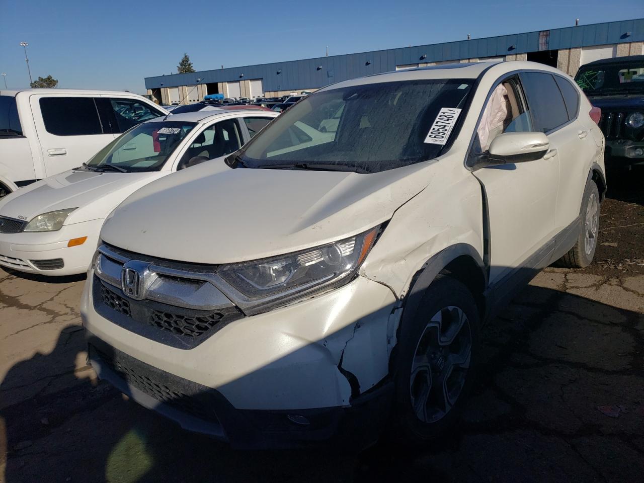 Photo 2 from auction – 2017 HONDA CR-V EX with VIN 5J6RW2H59HL033195