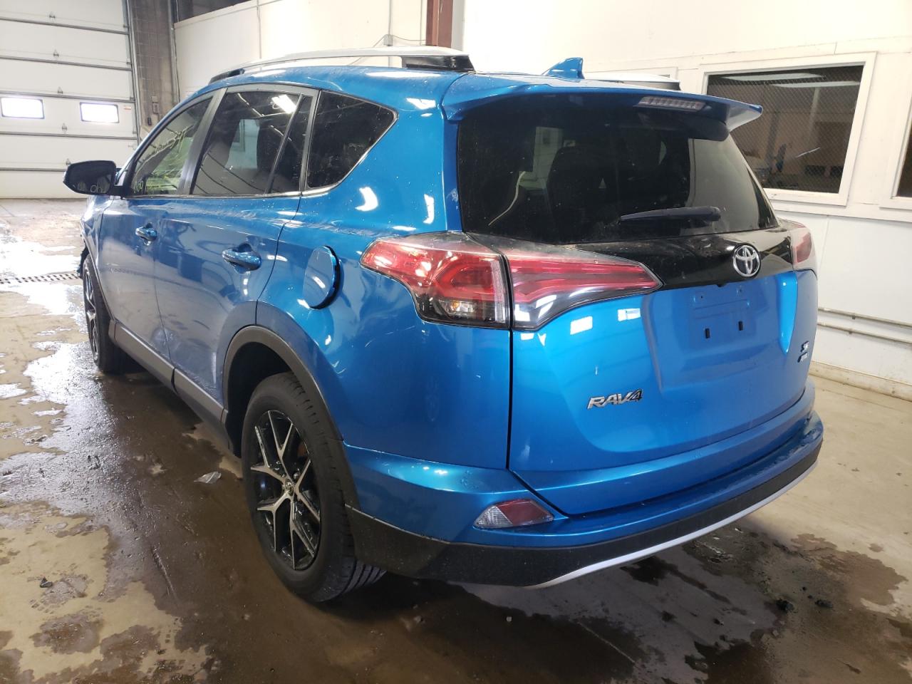 Photo 3 from auction – 2016 TOYOTA RAV4 SE with VIN JTMJFREV4GD188486