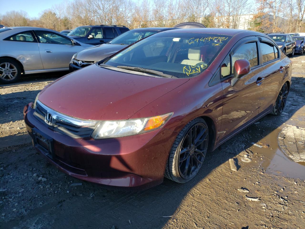 Photo 2 from auction – 2012 HONDA CIVIC LX with VIN 2HGFB2F55CH584674
