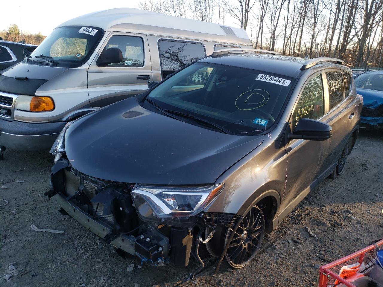 Photo 2 from auction – 2018 TOYOTA RAV4 LE with VIN 2T3BFREV4JW856513