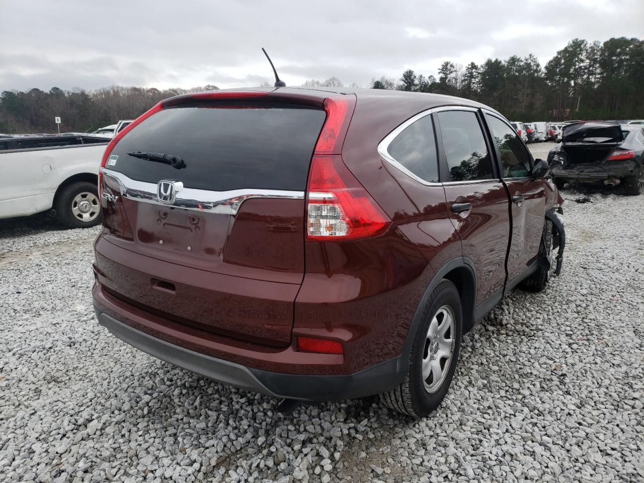 Photo 4 from auction – 2015 HONDA CR-V LX with VIN 3CZRM3H35FG705063