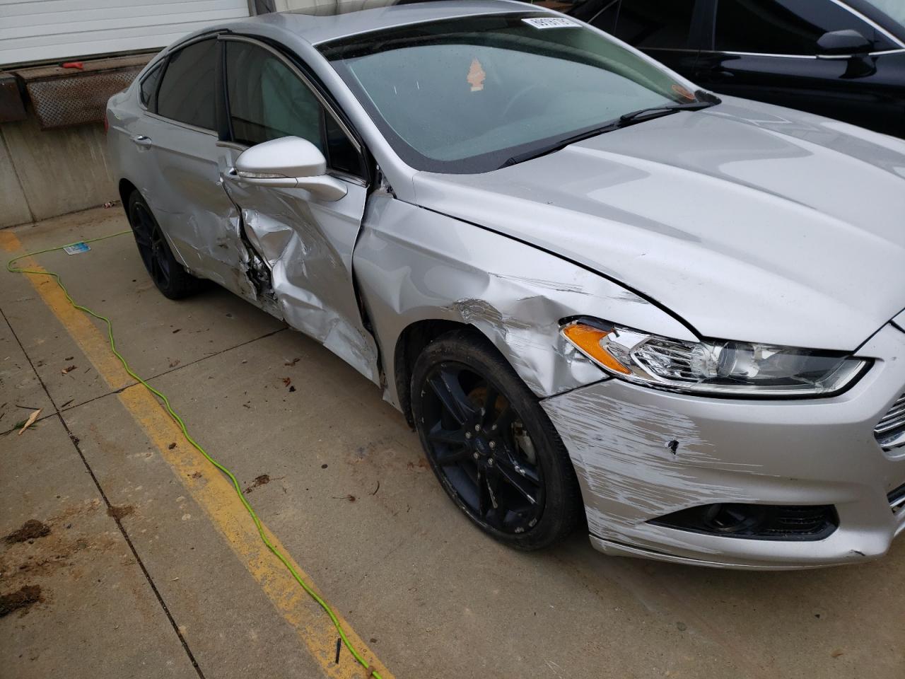Photo 9 from auction – 2014 FORD FUSION TIT with VIN 3FA6P0K93ER173526