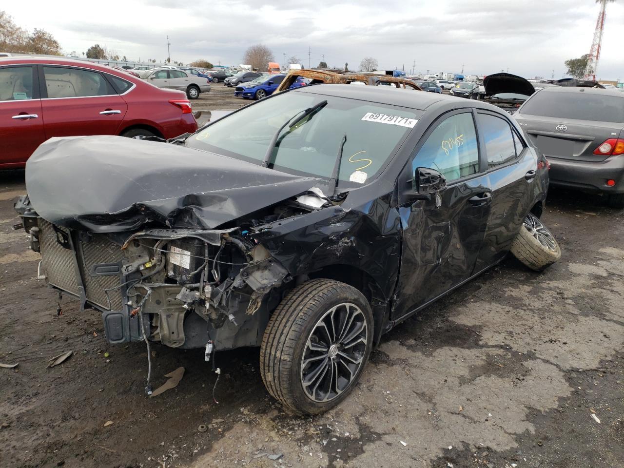 Photo 2 from auction – 2016 TOYOTA COROLLA L with VIN 5YFBURHE4GP435640