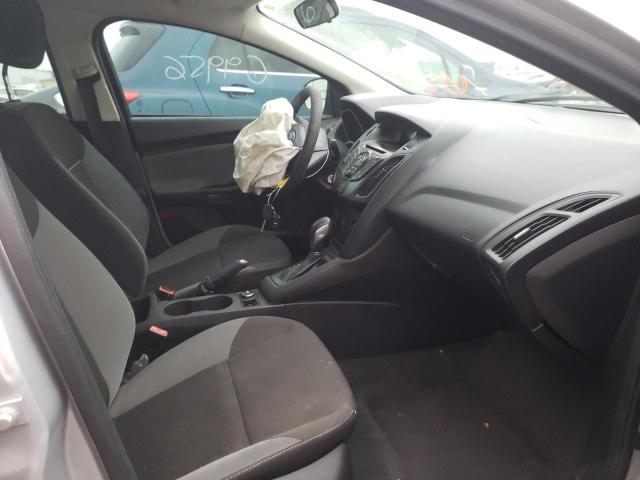 Photo 5 from auction – 2012 FORD FOCUS S with VIN 1FAHP3E22CL215334