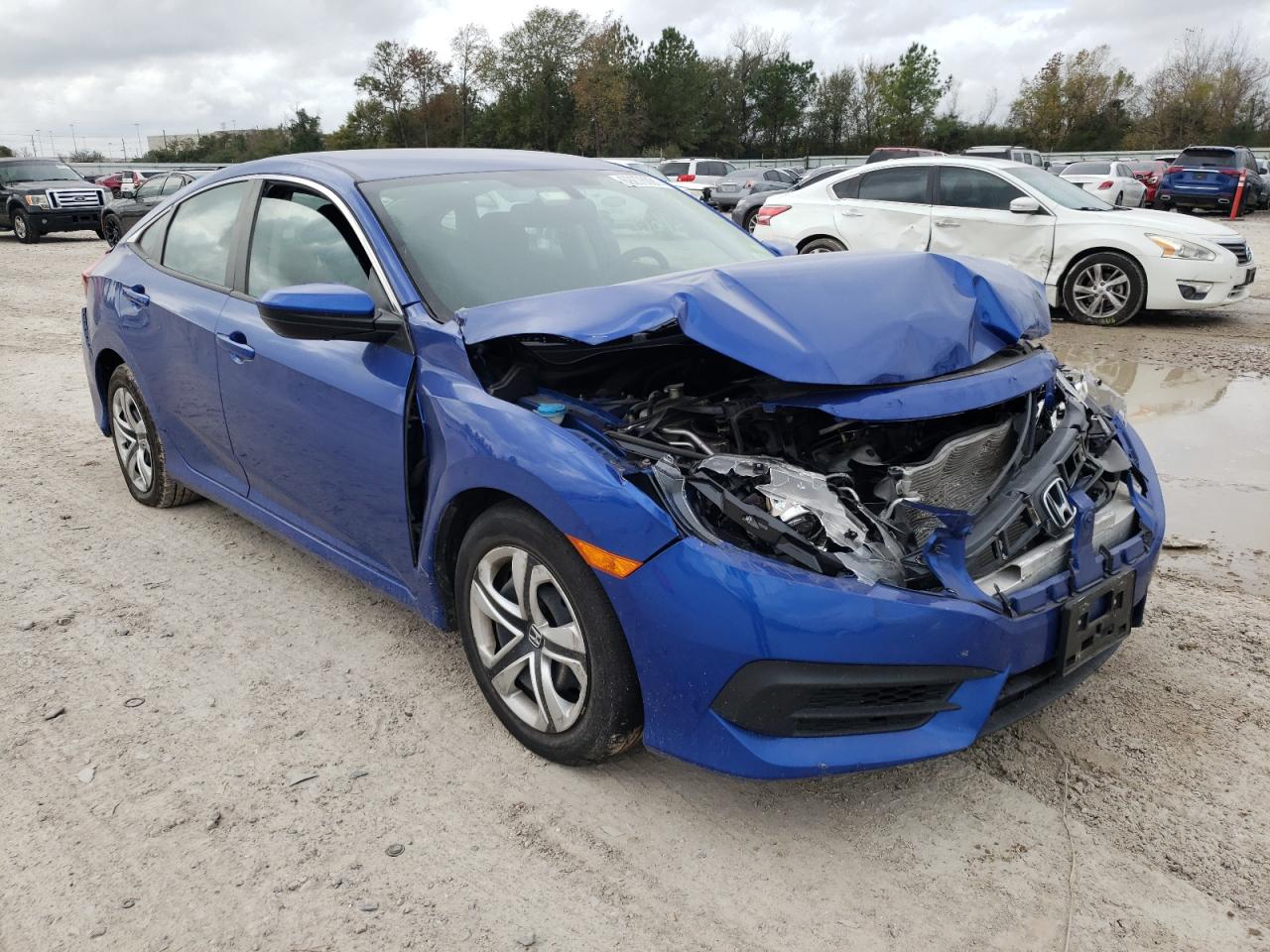 HONDA CIVIC LX 2017 with VIN 19XFC2F57HE229066 - Photo from auction
