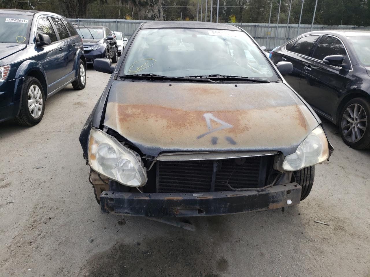 Photo 9 from auction – 2004 TOYOTA COROLLA CE with VIN 1NXBR32E04Z252236