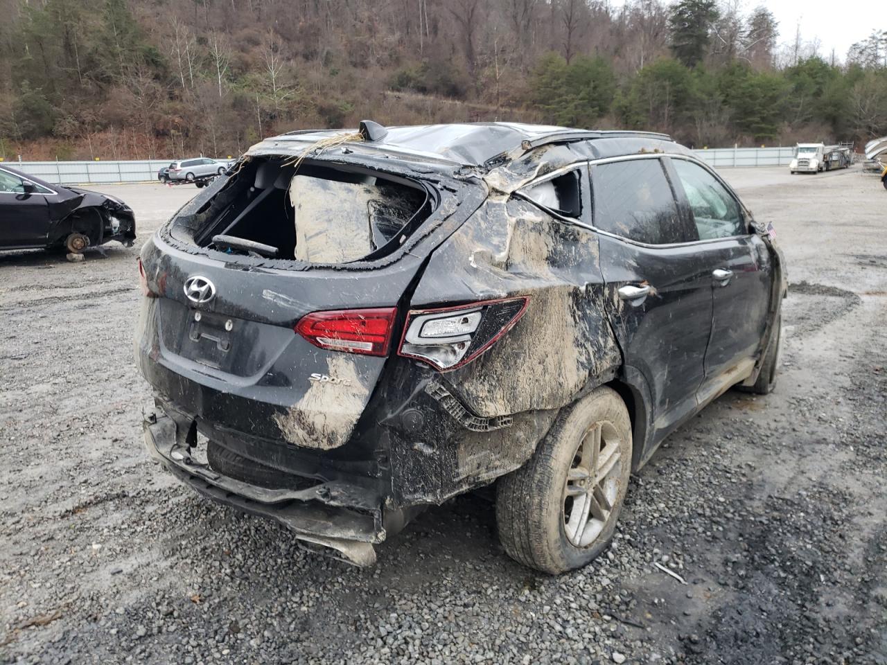 Photo 4 from auction – 2017 HYUNDAI SANTA FE S with VIN 5NMZU3LB0HH049902
