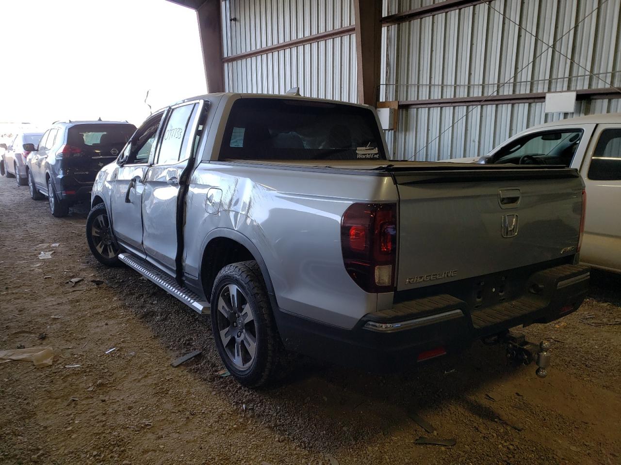 Photo 3 from auction – 2018 HONDA RIDGELINE with VIN 5FPYK3F64JB005805
