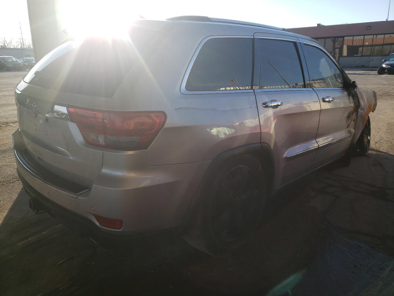 Photo 4 from auction – 2012 JEEP GRAND CHER with VIN 1C4RJFCT5CC215115