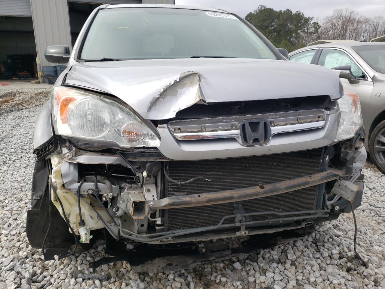 Photo 9 from auction – 2007 HONDA CRV with VIN JHLRE38517C081953