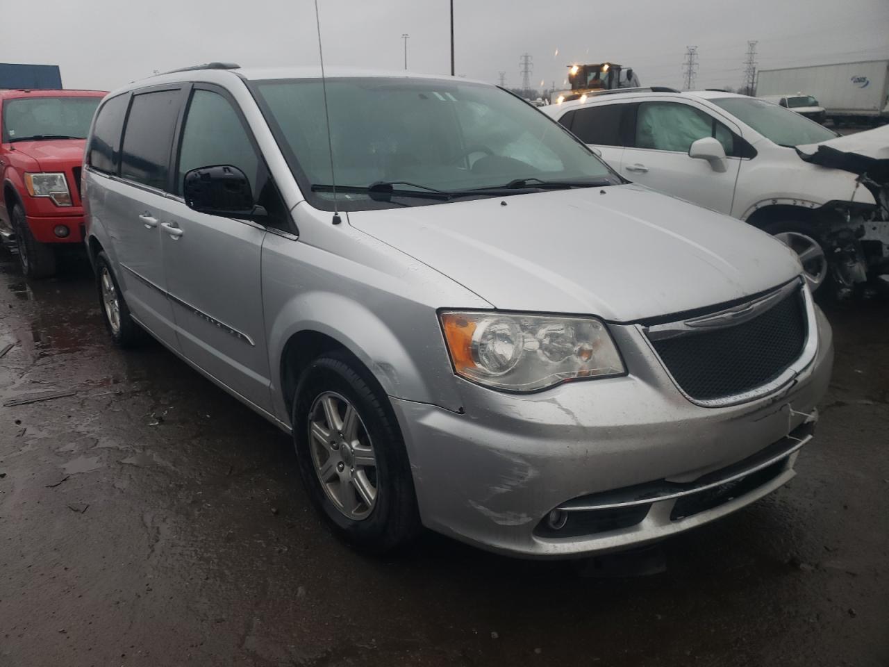 CHRYSLER TOWN & COU 2011 with VIN 2A4RR5DG7BR775500 - Photo from auction