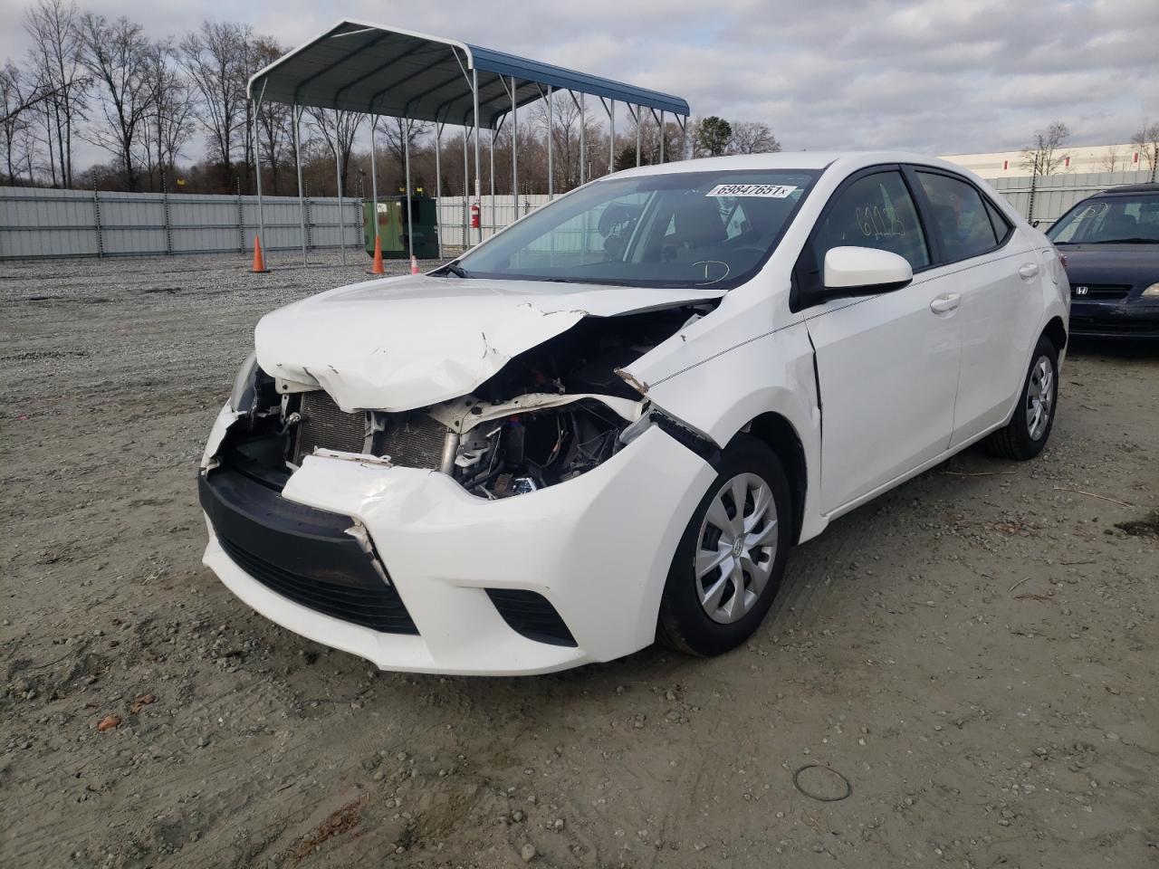 Photo 2 from auction – 2016 TOYOTA COROLLA L with VIN 5YFBURHE3GP399892