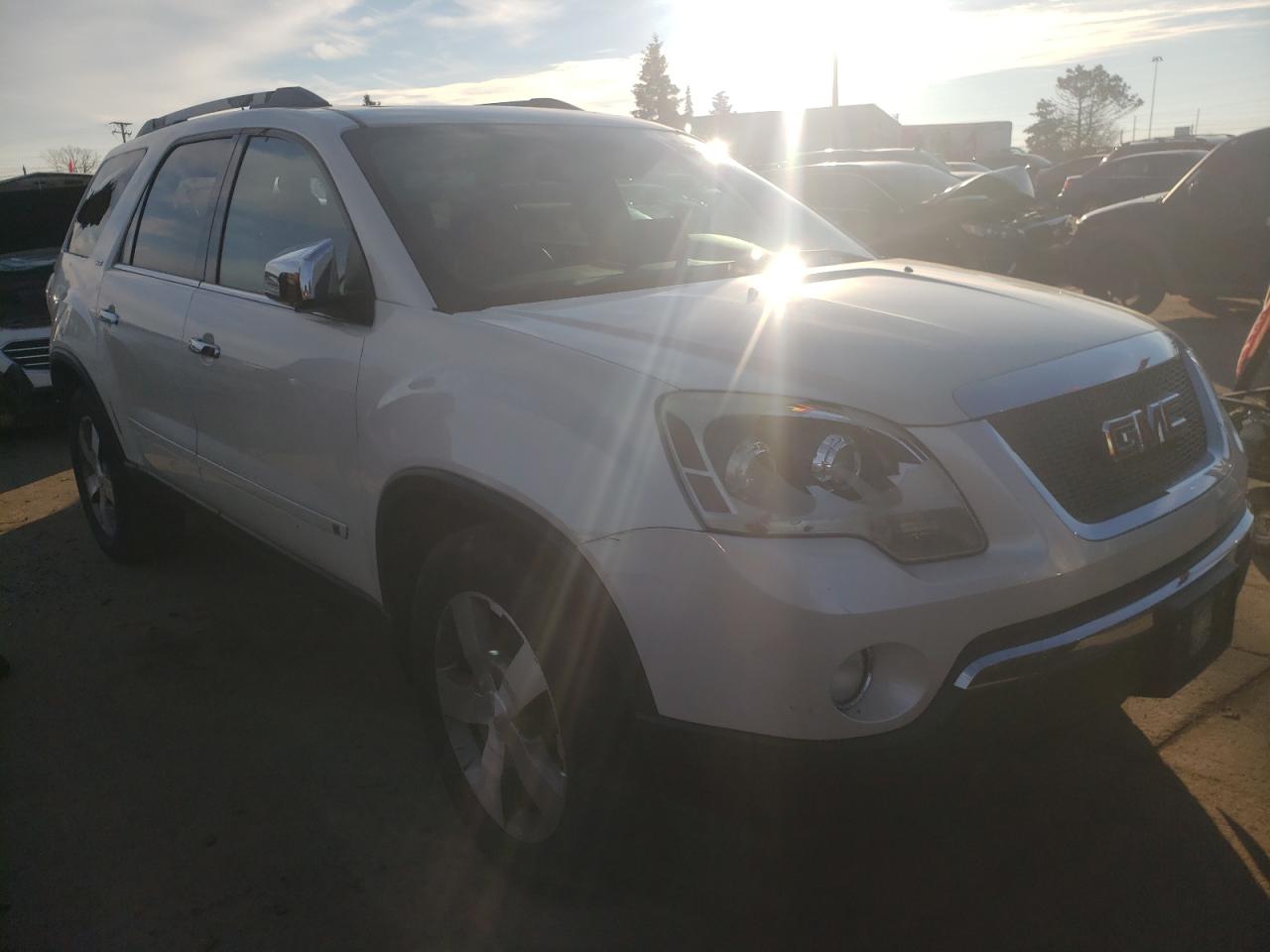 GMC ACADIA SLT 2010 with VIN 1GKLRMED5AJ111469 - Photo from auction