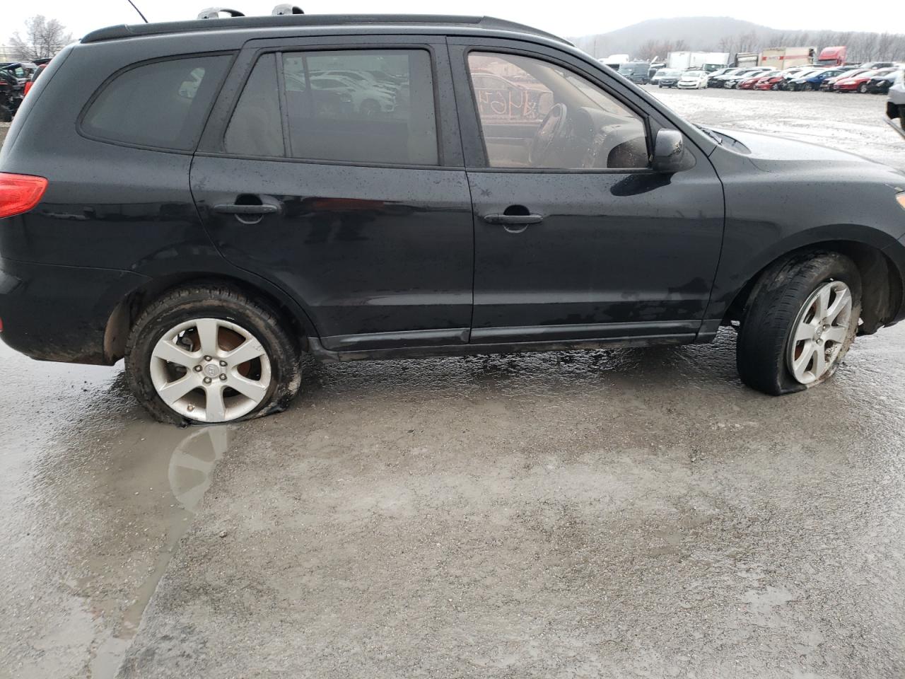Photo 9 from auction – 2009 HYUNDAI SANTA FE S with VIN 5NMSH13E79H331573