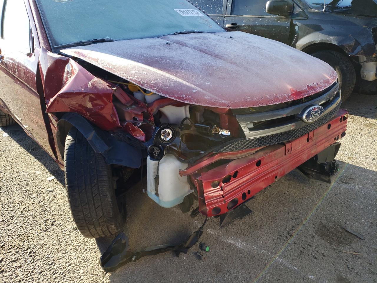 Photo 9 from auction – 2011 FORD FOCUS SES with VIN 1FAHP3GN3BW107941