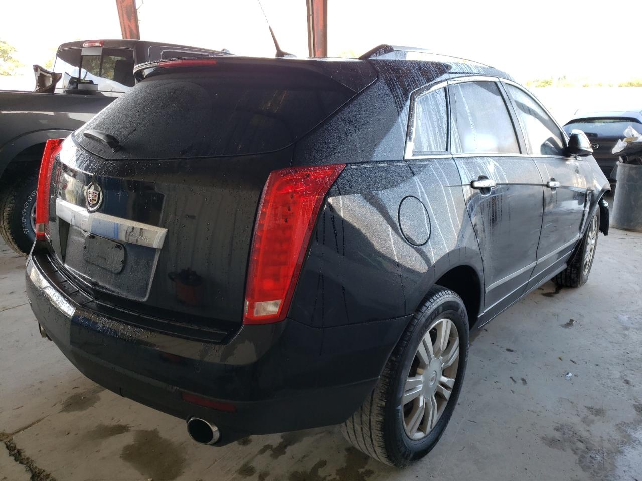 Photo 4 from auction – 2011 CADILLAC SRX LUXURY with VIN 3GYFNAEY9BS533437