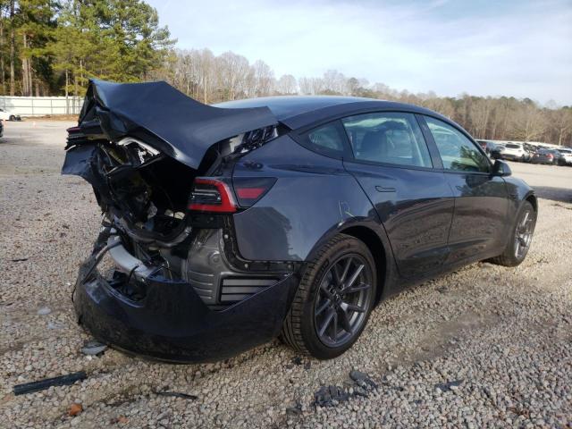 Photo 4 from auction – 2021 TESLA MODEL 3 with VIN 5YJ3E1EA7MF092852