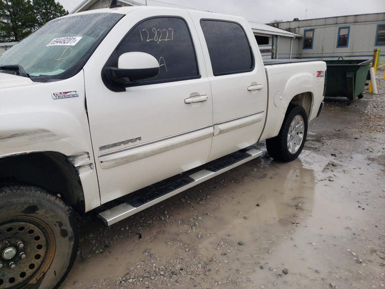 Photo 10 from auction – 2011 GMC SIERRA K15 with VIN 3GTP2VE35BG389905
