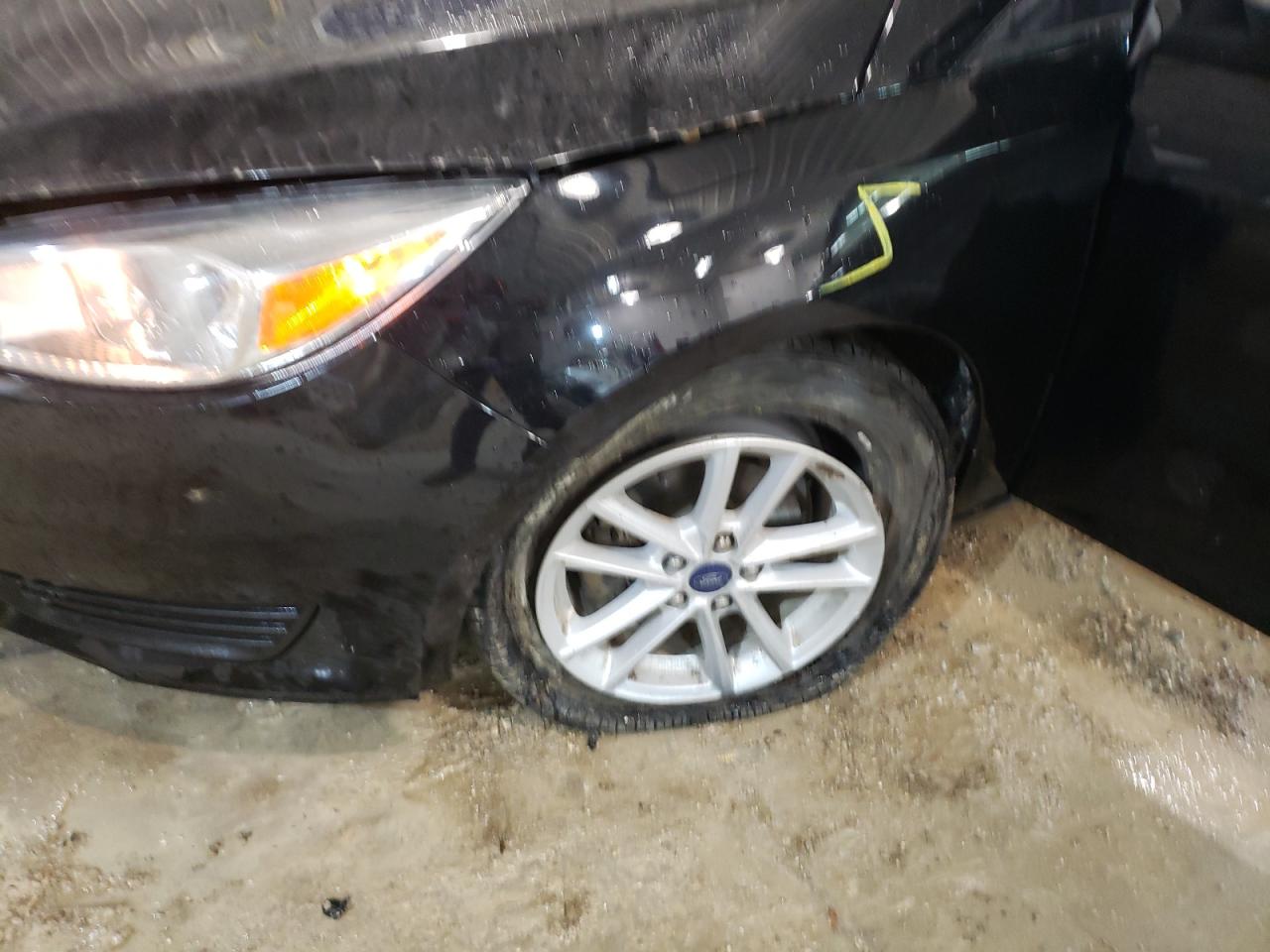 Photo 9 from auction – 2017 FORD FOCUS SE with VIN 1FADP3F26HL342804