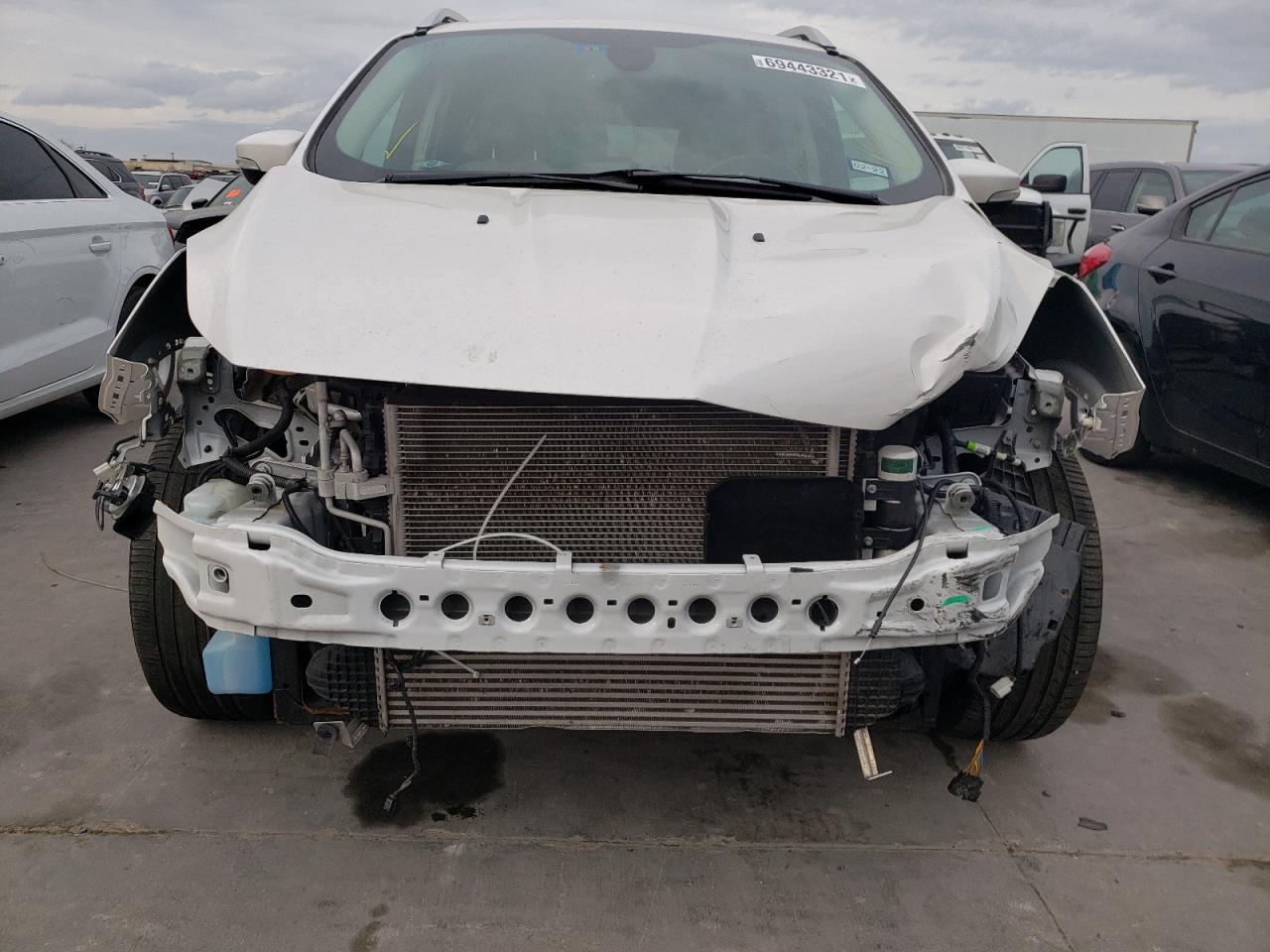 Photo 9 from auction – 2014 FORD ESCAPE TIT with VIN 1FMCU0J91EUC18863